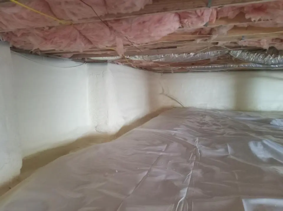 Crawl space encapsulation with closed-cell spray foam for Roof Waterproofing in Madeira